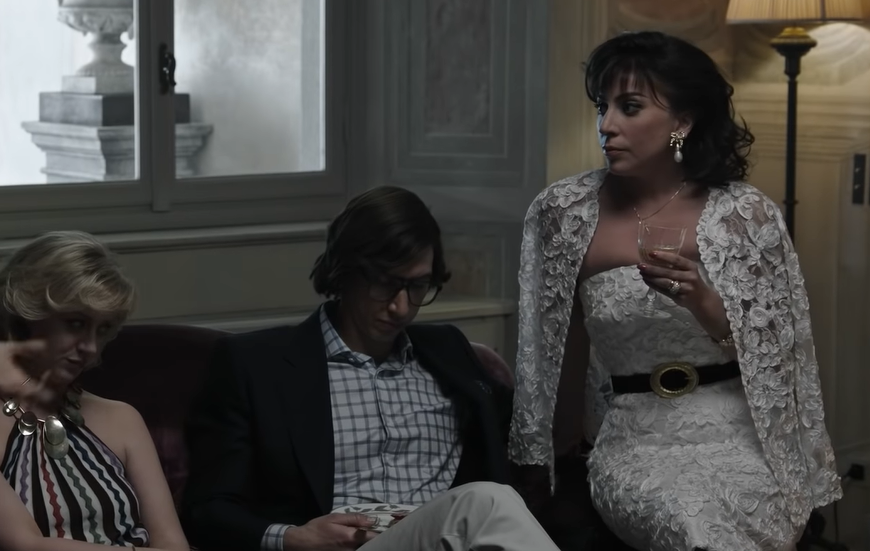 Lady Gaga dengan gaun dan jaket renda. (Dok. Youtube, MGM)