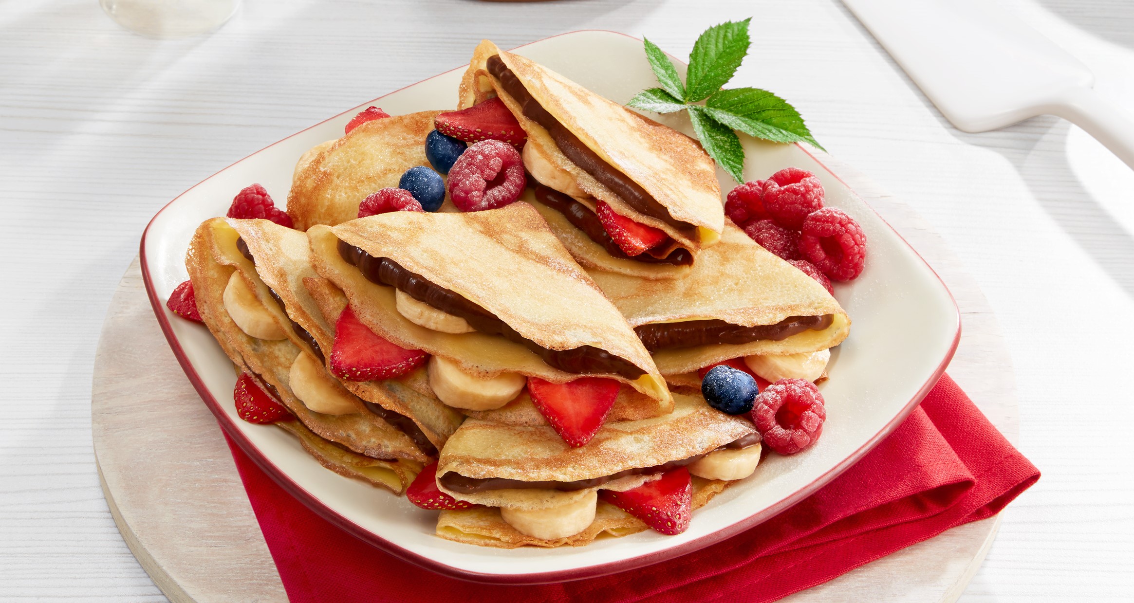 Crepes isi buah dan cokelat. (Dok. Ferrero)
