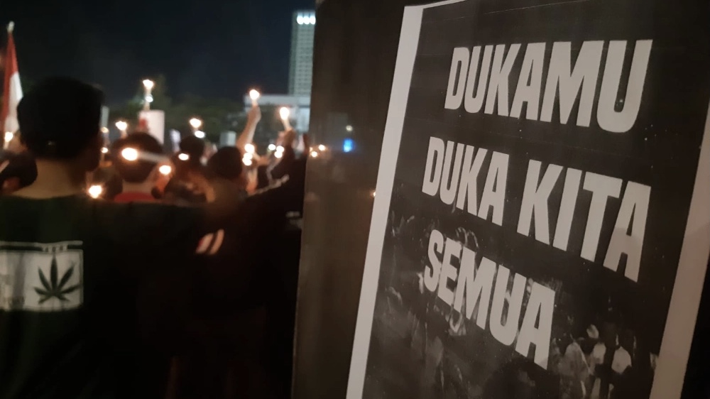 Aksi soladiritas Aremania terhadap korban tragedi Kanjuruhan. (Sumber gambar : Bisnis.com)